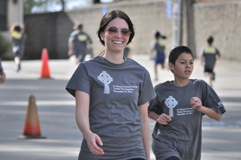 Woman and boy jogging